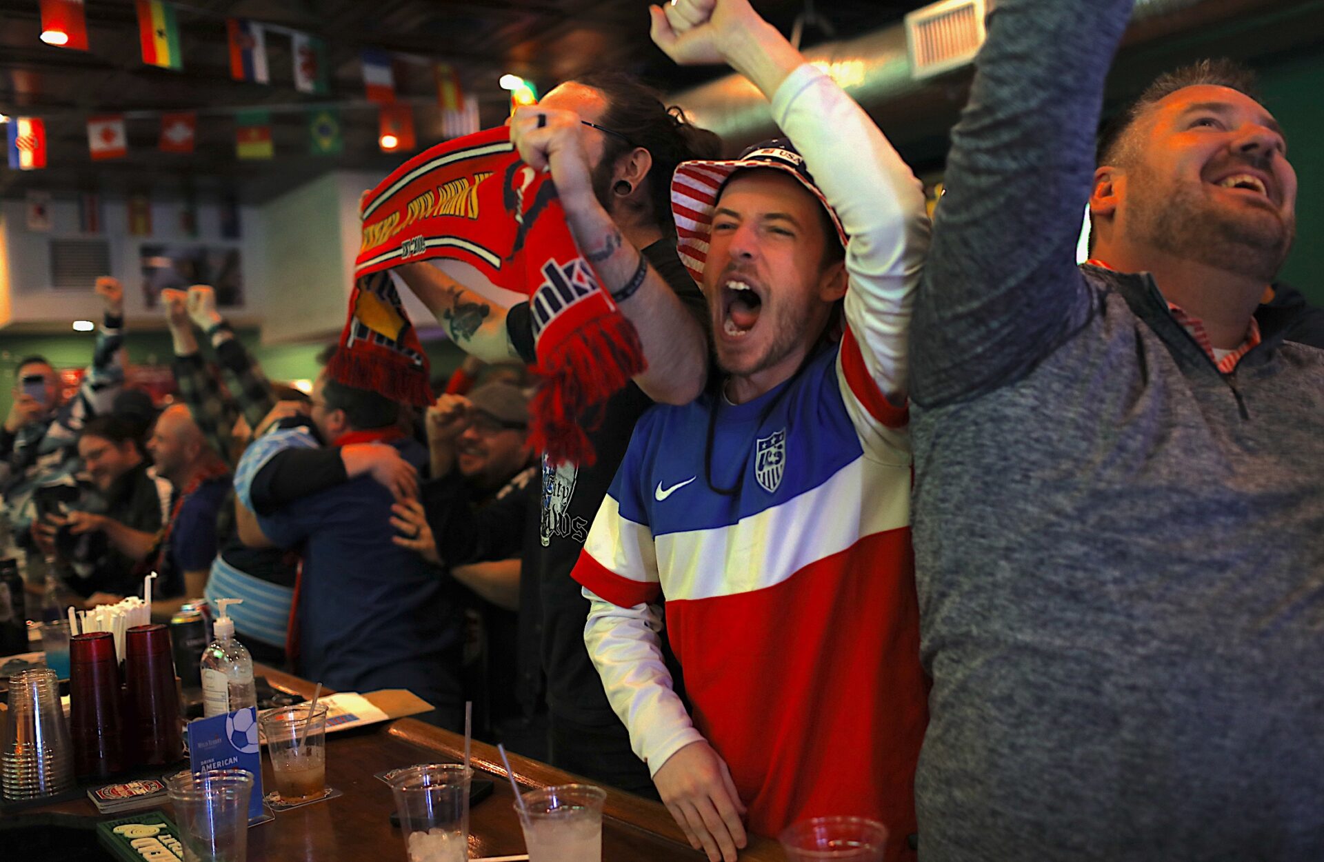 In a Morningside pub, soccer fans cheer and sweat during a gut ...